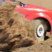 rallybil slirar med framdäcken i närbild.jpg